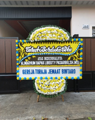 Papan Bunga Duka di Girian